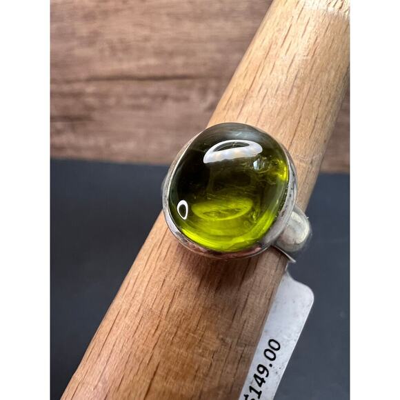 SOLD 

NEW size 7 oval peridot sterling silver ring 6.20 grams - Picture 8 of 15